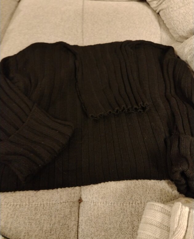 Pull noir à rayures